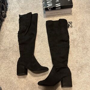 Knee high boots with lace up back